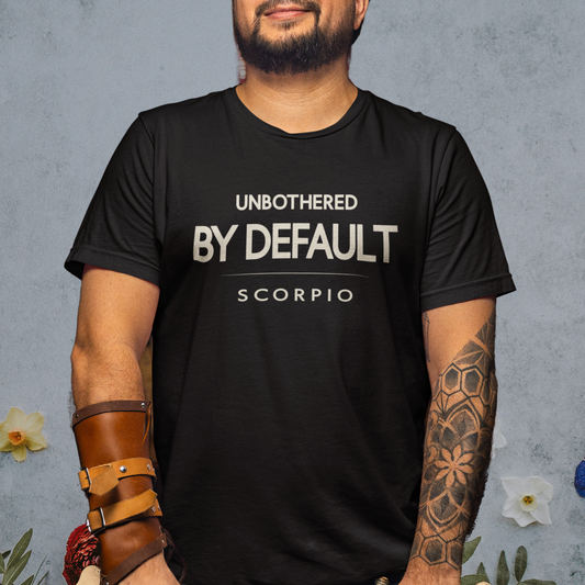Model wearing Scorpio zodiac t-shirt with “Unbothered by Default” typography quote design