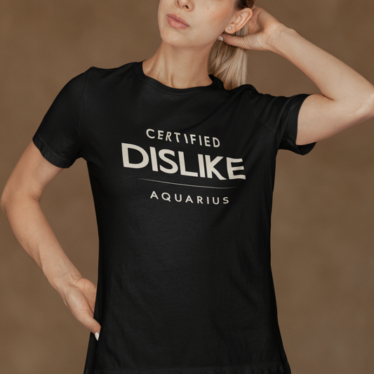Model wearing Aquarius zodiac t-shirt with Certified Dislike typography on black tee