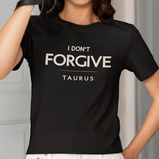 Model wearing Taurus zodiac t-shirt with I Don’t Forgive typography.