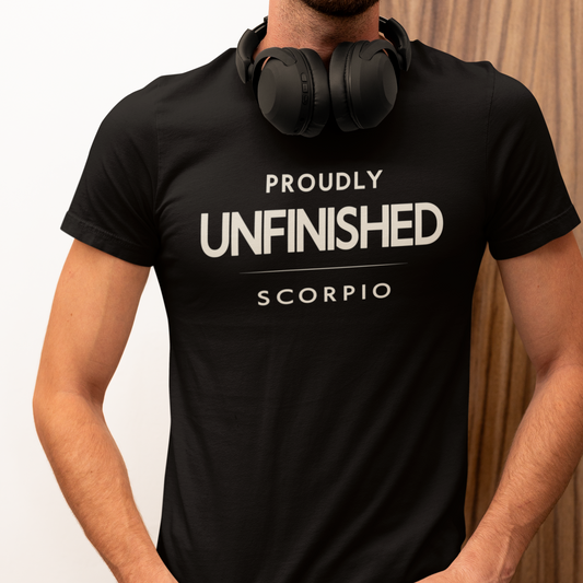 Model wearing Scorpio zodiac t-shirt with “Proudly Unfinished” typography quote design