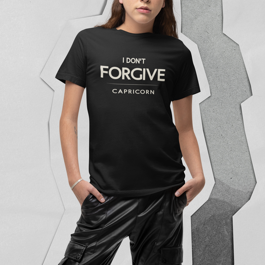 Model wearing Capricorn zodiac t-shirt with “I Don’t Forgive” typography quote design
