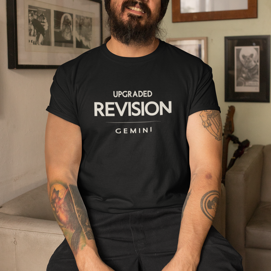 Model wearing Gemini zodiac t-shirt with “Upgraded Revision” typography quote design