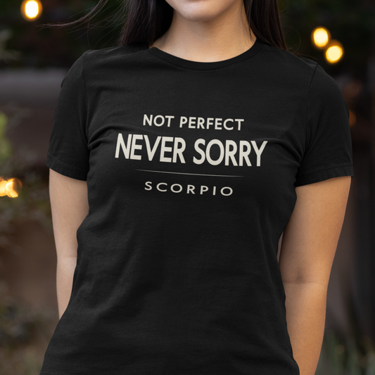 Model wearing Scorpio zodiac t-shirt with “Not Perfect Never Sorry” typography quote design