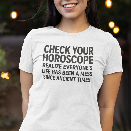 Model wearing zodiac t-shirt with “Check Your Horoscope” typography quote design.