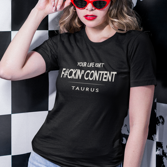 Model wearing Taurus zodiac t-shirt with Your Life Isn’t F#ckin’ Content typography.