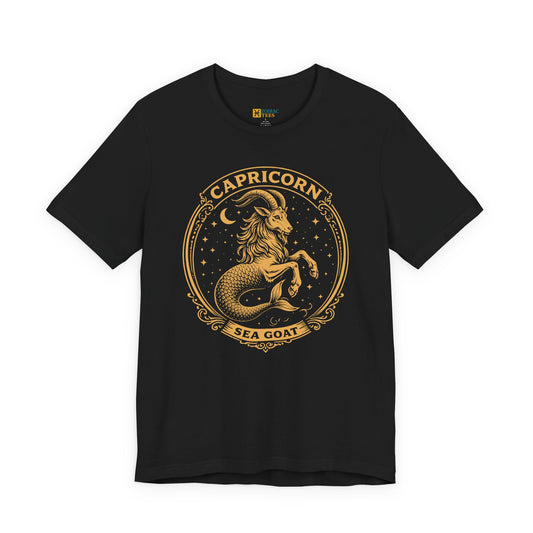 Black T-shirt featuring an ornate vintage gold Capricorn Sea Goat zodiac illustration inside a decorative circular frame.