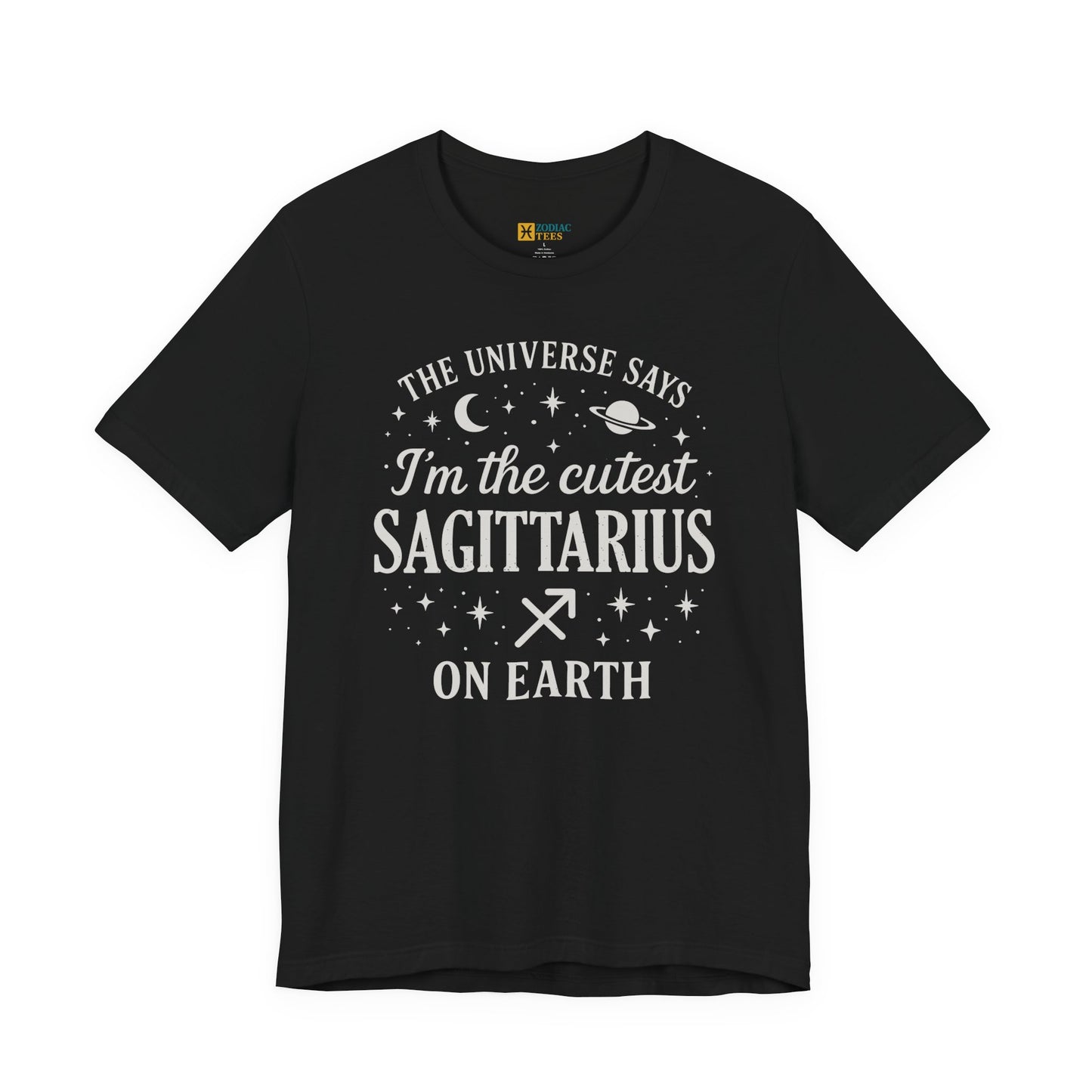 A black T-shirt featuring a white Sagittarius zodiac typography design that reads “The Universe Says I’m the Cutest Sagittarius on Earth,” with stars, a crescent moon, a planet and the Sagittarius zodiac symbol.
