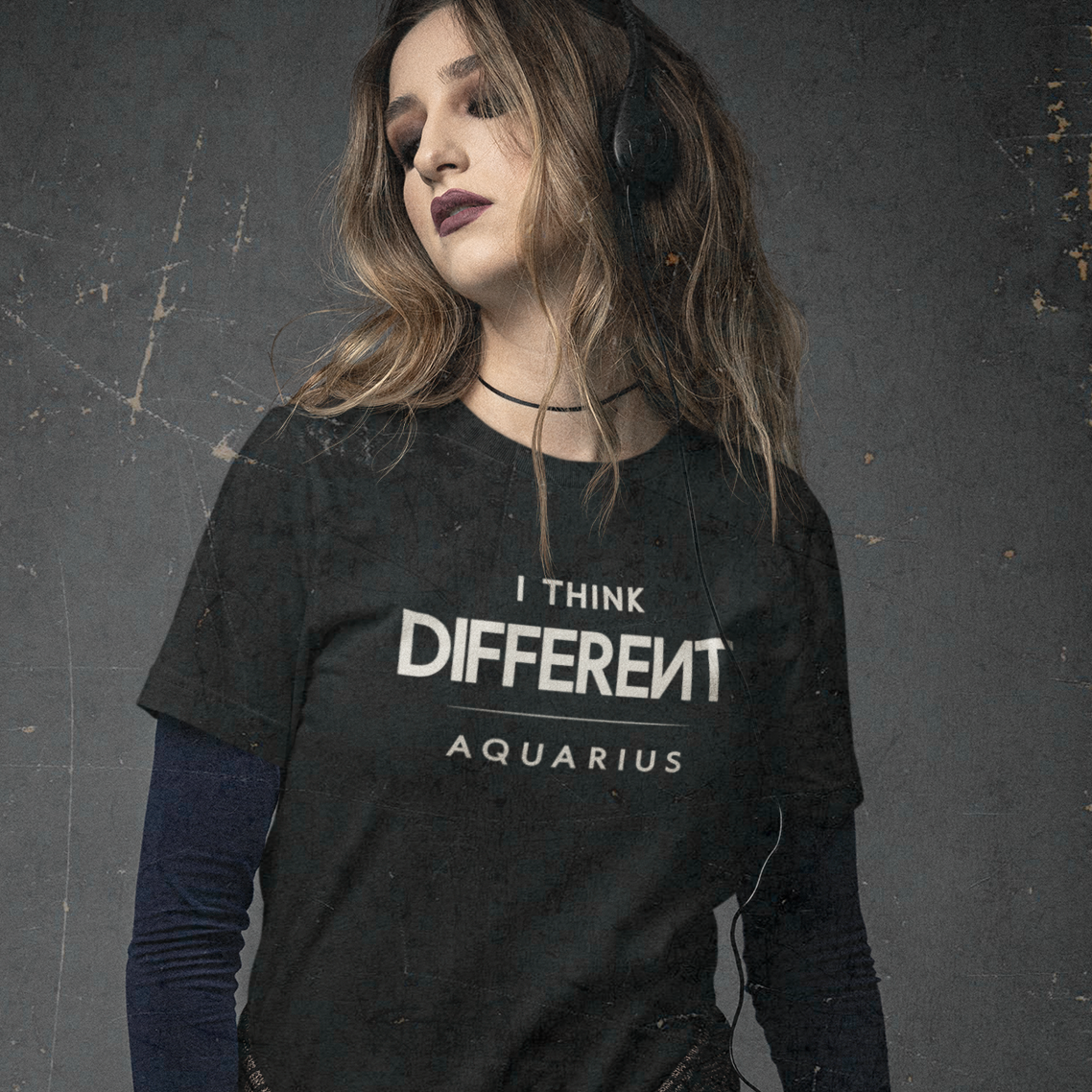 Model wearing Aquarius zodiac T-shirt with I think different quote design.