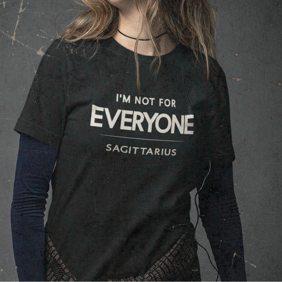 Model wearing Sagittarius zodiac t-shirt with “I’m Not for Everyone” typography quote