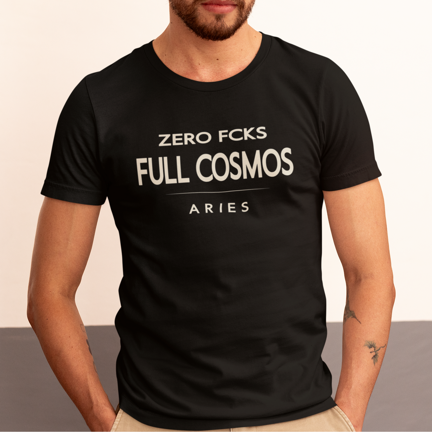 Model wearing Aries zodiac t-shirt with “Zero Fcks Full Cosmos” typography quote