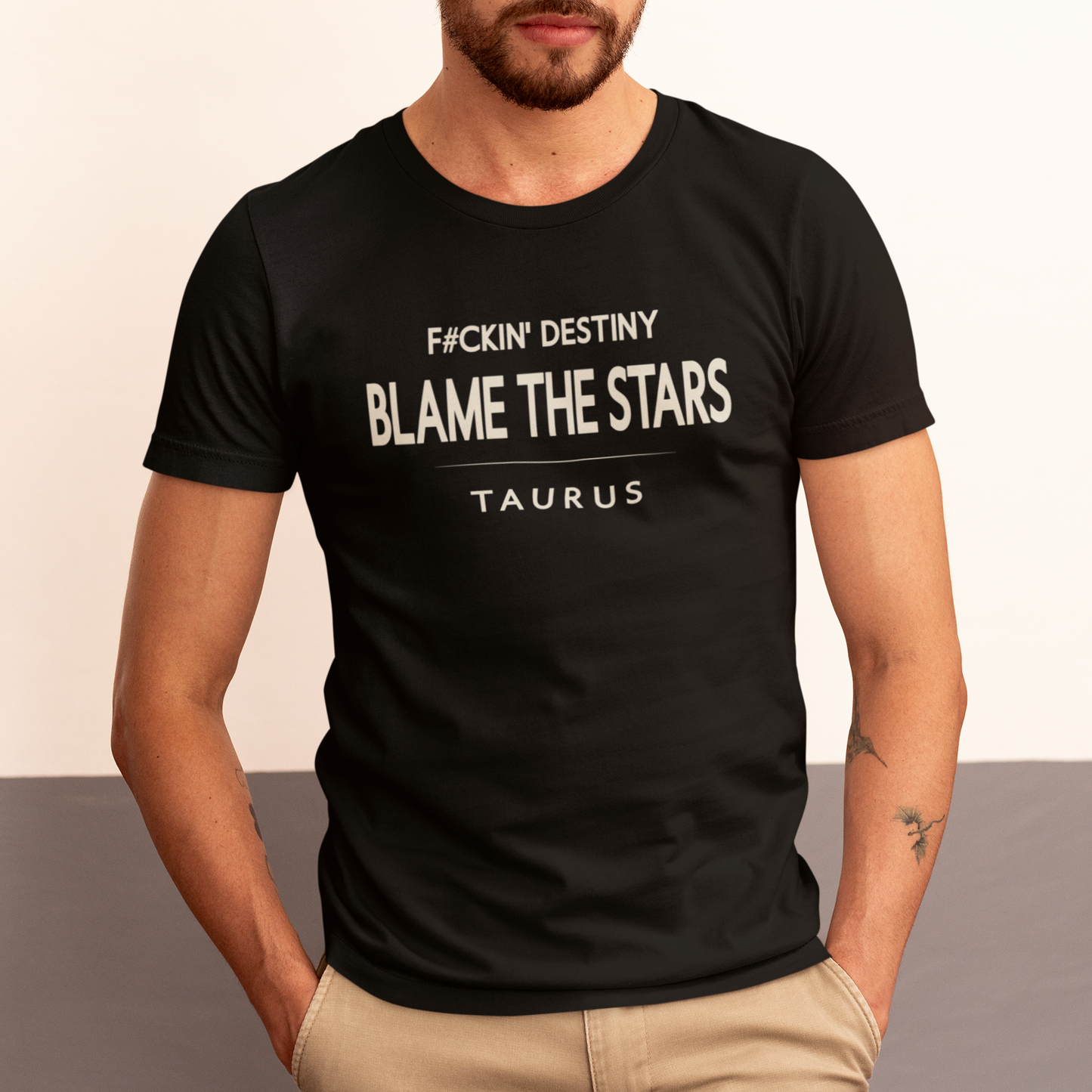 Model wearing Taurus zodiac t-shirt with “Fckin Destiny Blame the Stars” typography quote