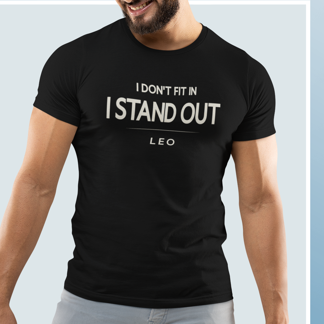 Model wearing Leo zodiac t-shirt with bold “I Stand Out” typography quote