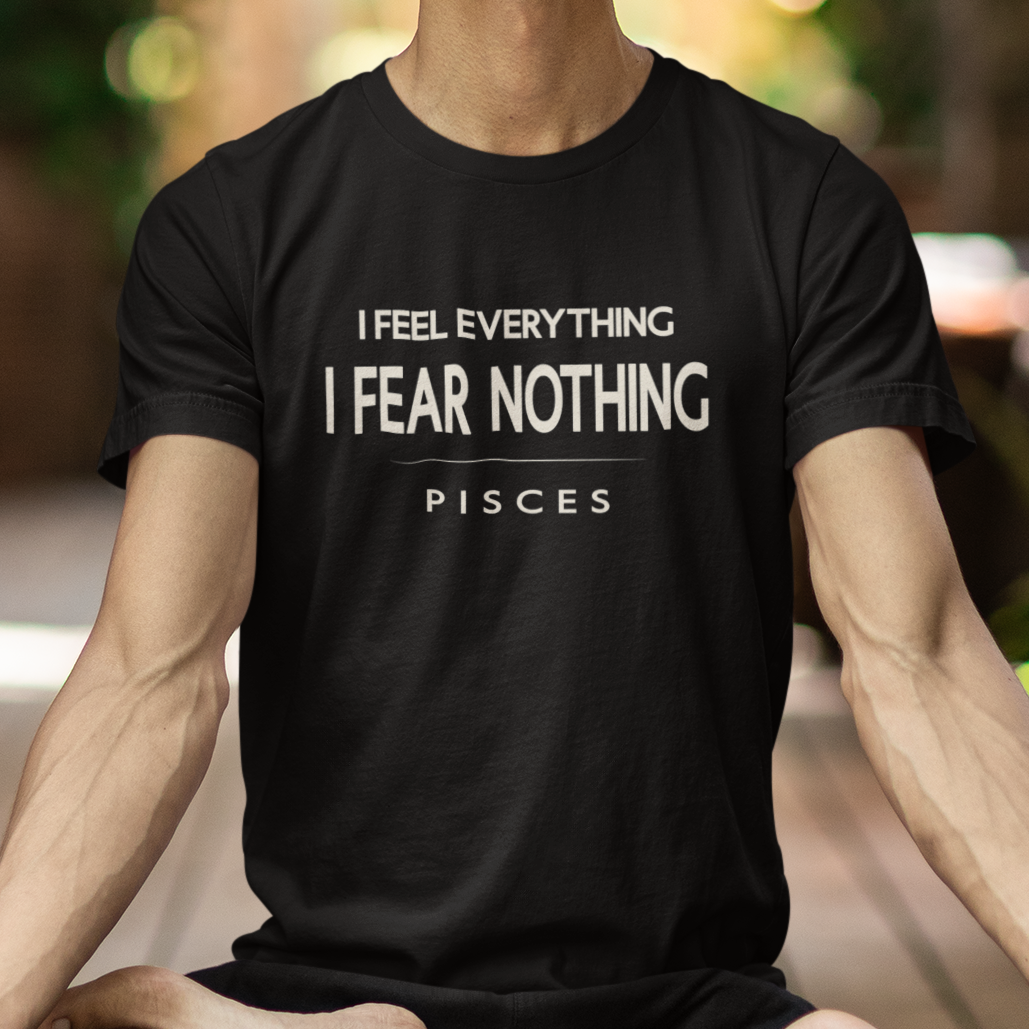 Model wearing Pisces zodiac t-shirt with “I Feel Everything I Fear Nothing” typography quote