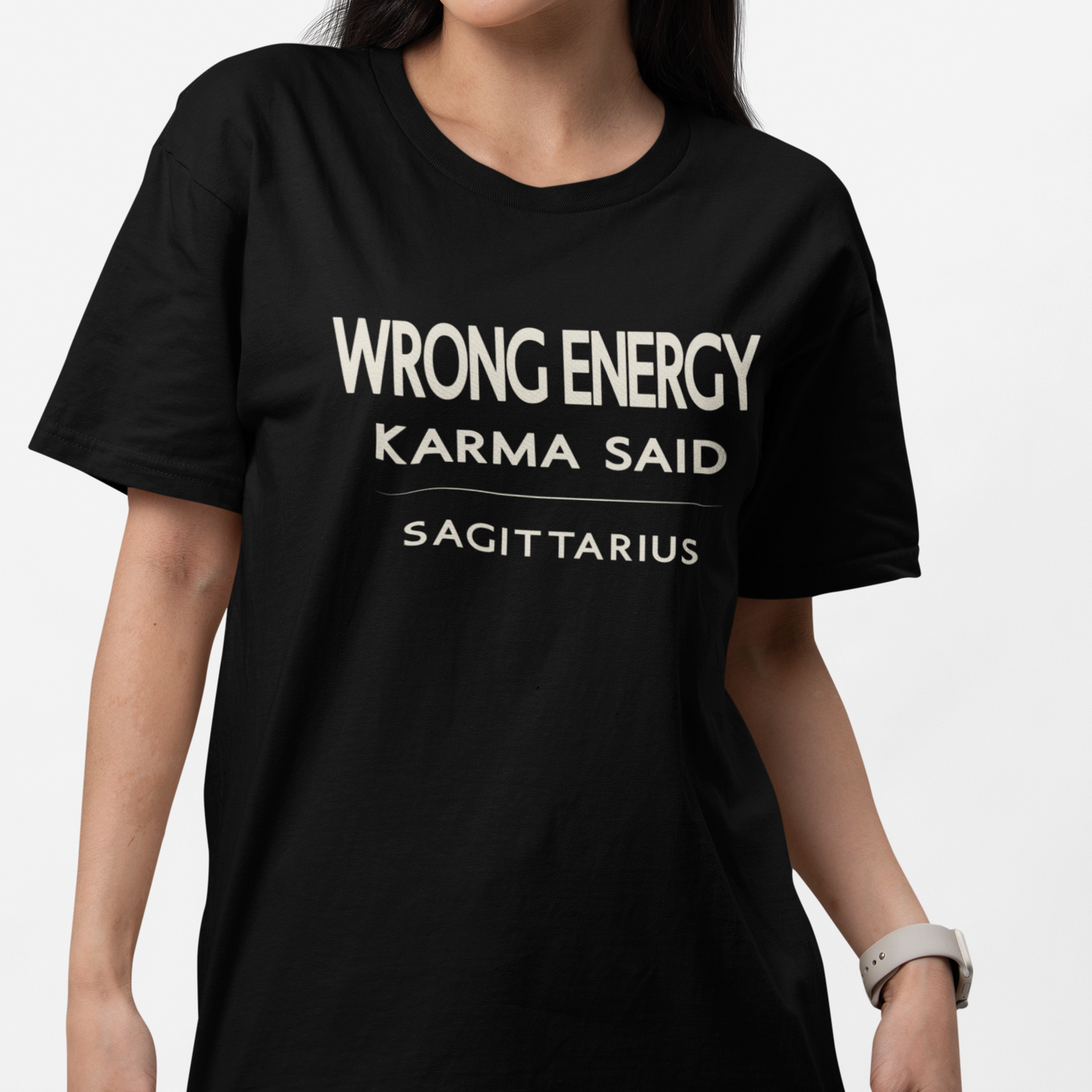 Model wearing Sagittarius zodiac t-shirt with “Wrong Energy Karma Said” typography quote