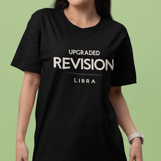 Model wearing Libra zodiac t-shirt with “Upgraded Revision” typography quote design