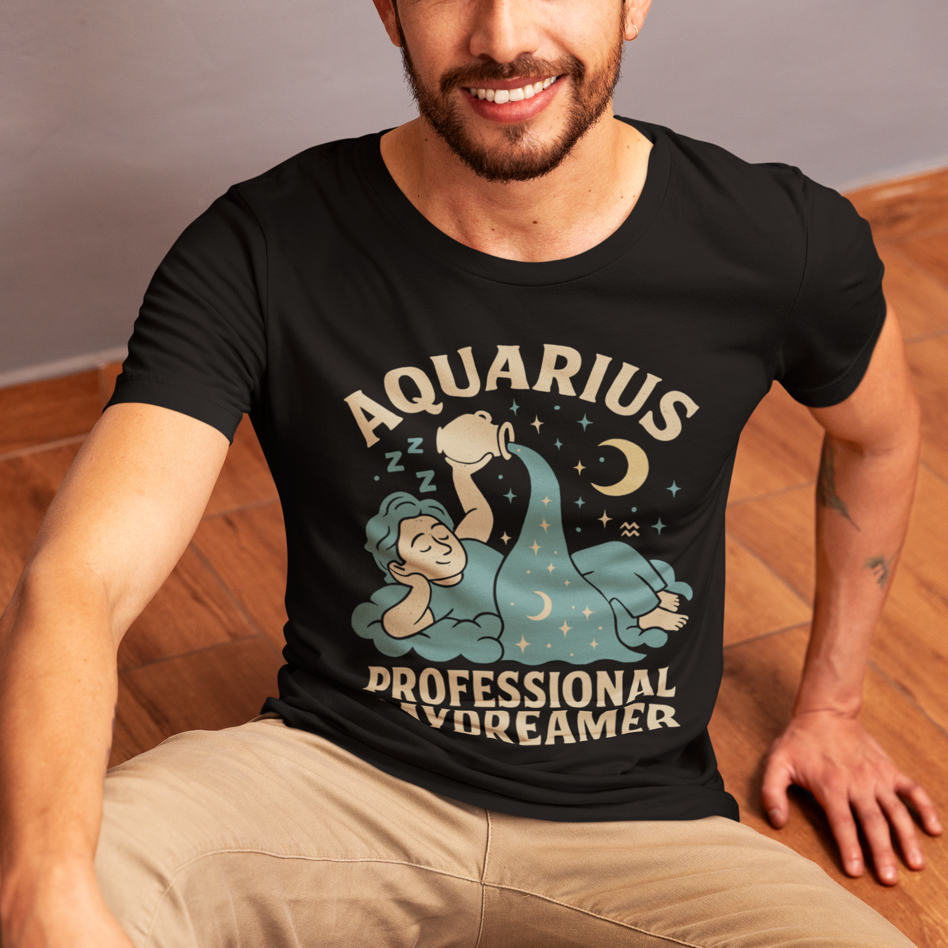 Model wearing Aquarius zodiac T-shirt with professional daydreamer illustration.