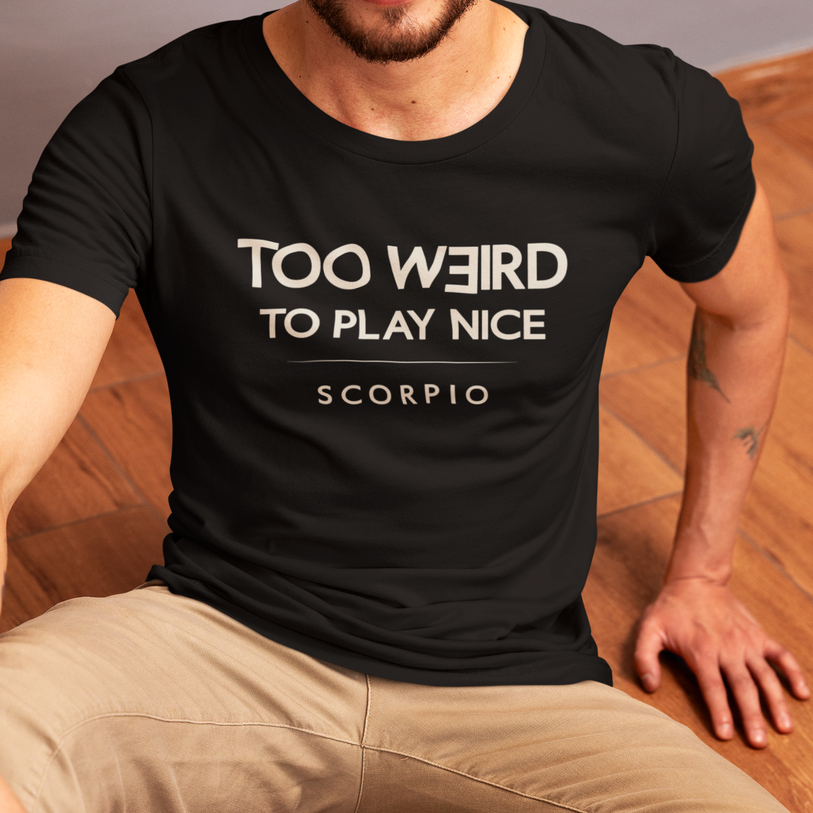 Model wearing Scorpio zodiac t-shirt with “Too Weird to Play Nice” typography quote