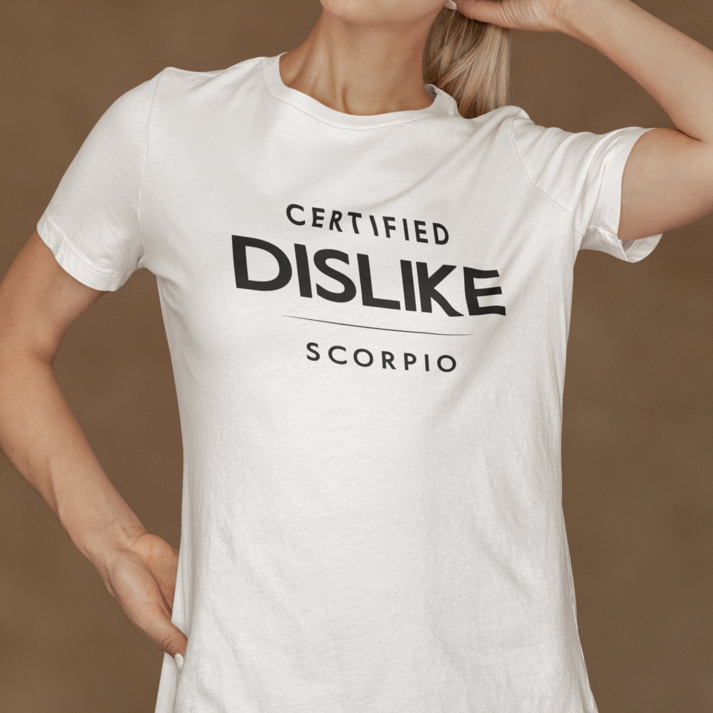 Model wearing Scorpio zodiac t-shirt with Certified Dislike typography on white tee