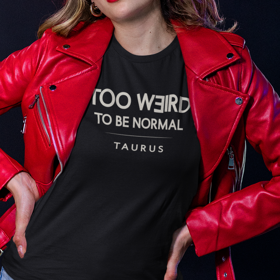 Model wearing Taurus zodiac t-shirt with “Too Weird to Be Normal” typography quote