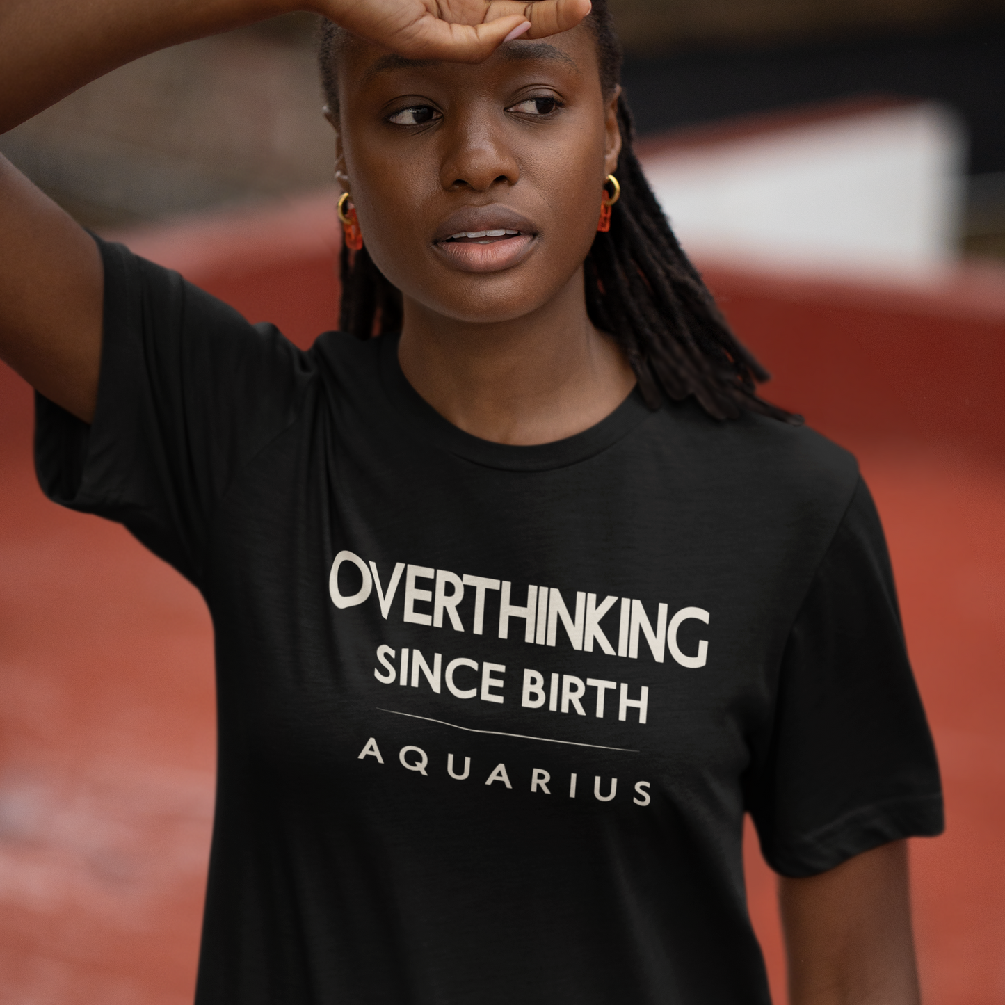 Model wearing Aquarius zodiac T-shirt with overthinking since birth quote design.