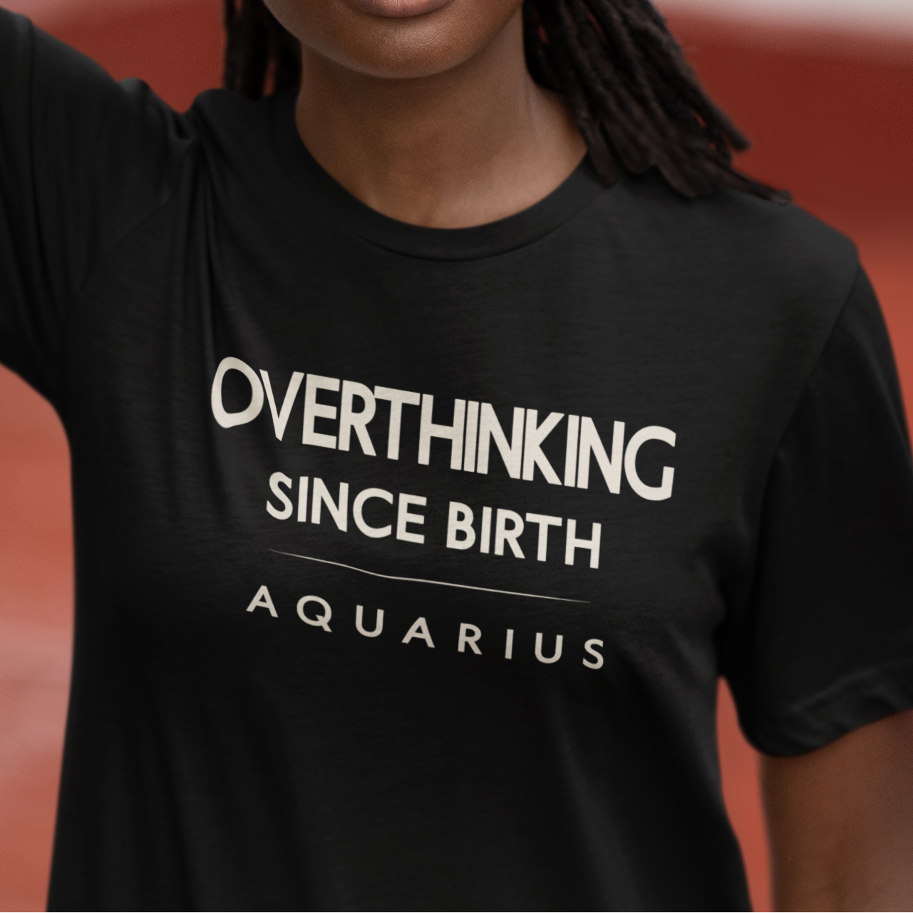 Model wearing Aquarius zodiac T-shirt with overthinking since birth quote design.