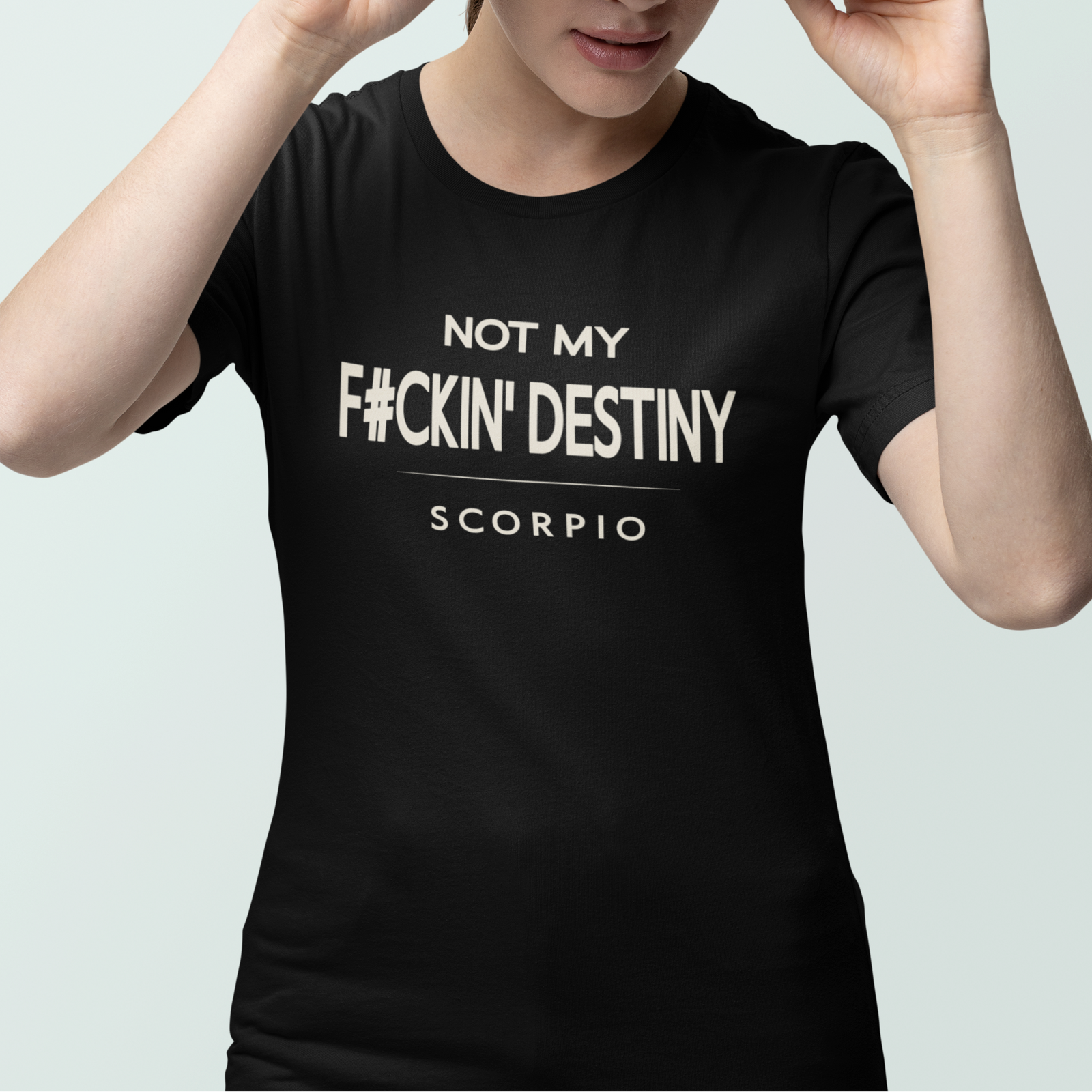 Woman wearing Scorpio zodiac t-shirt with “Not My F#ckin' Destiny” quote