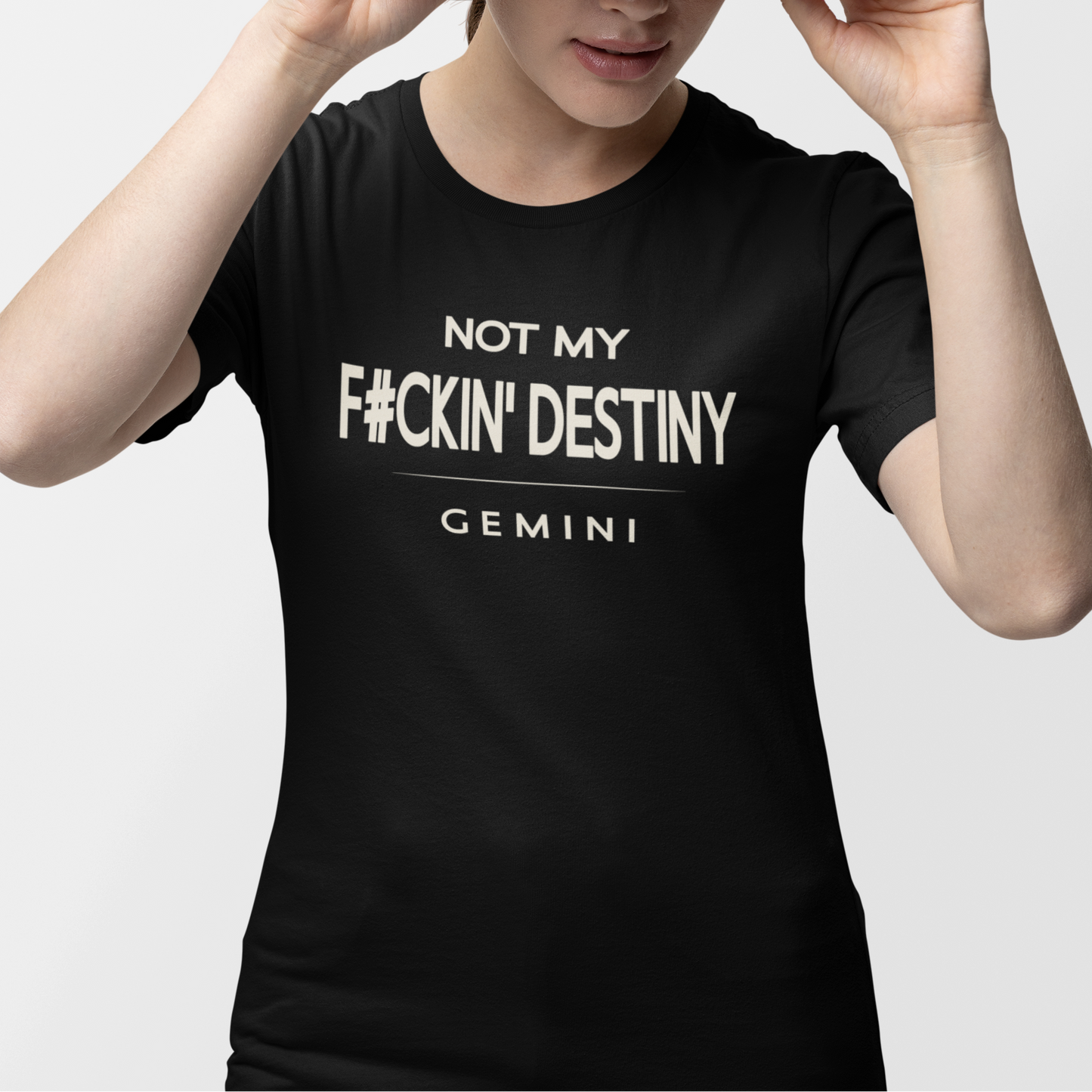 Model wearing Gemini zodiac t-shirt with “Not My F#ckin' Destiny” typography quote