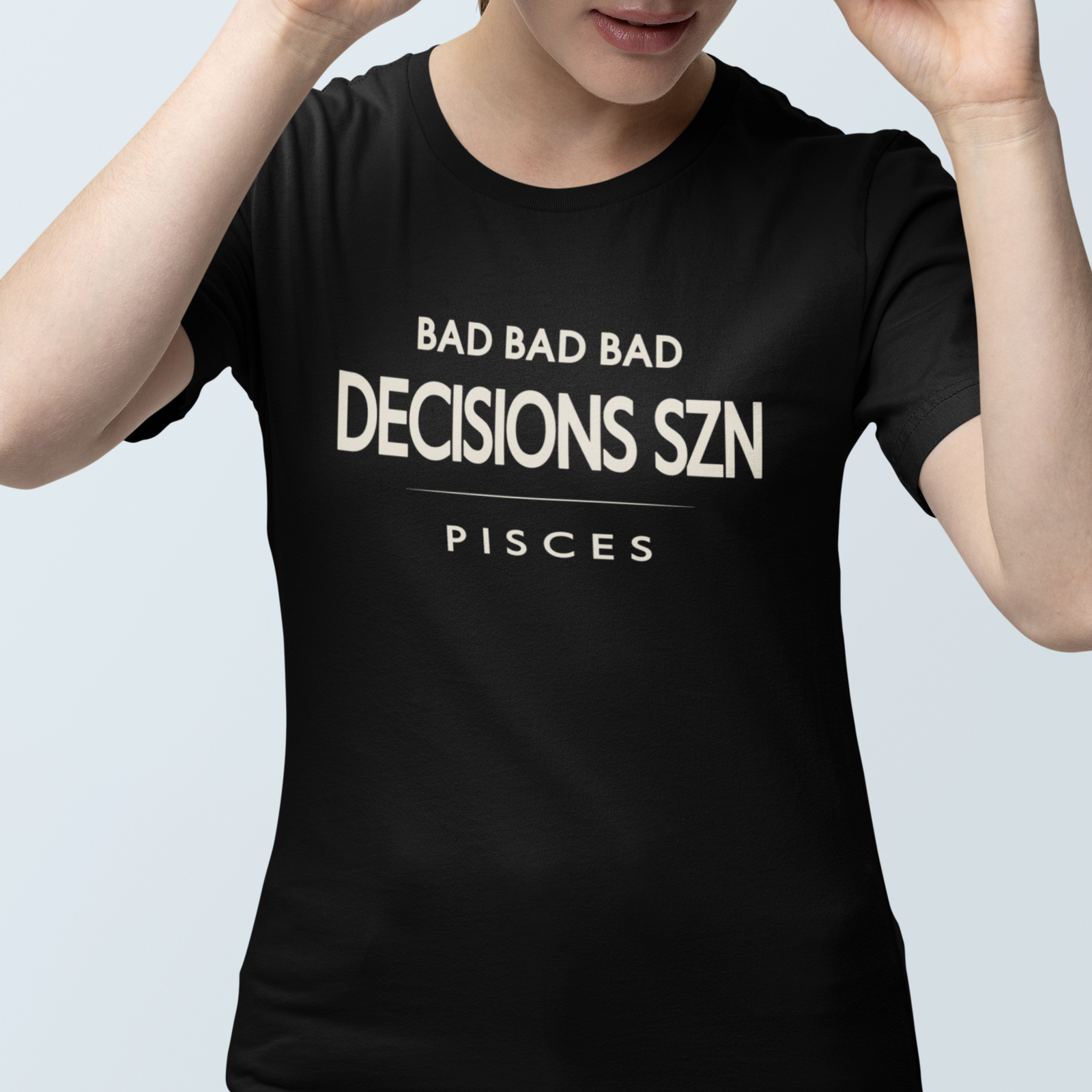 Model wearing Pisces zodiac t-shirt with “Bad Bad Bad Decisions SZN” typography quote