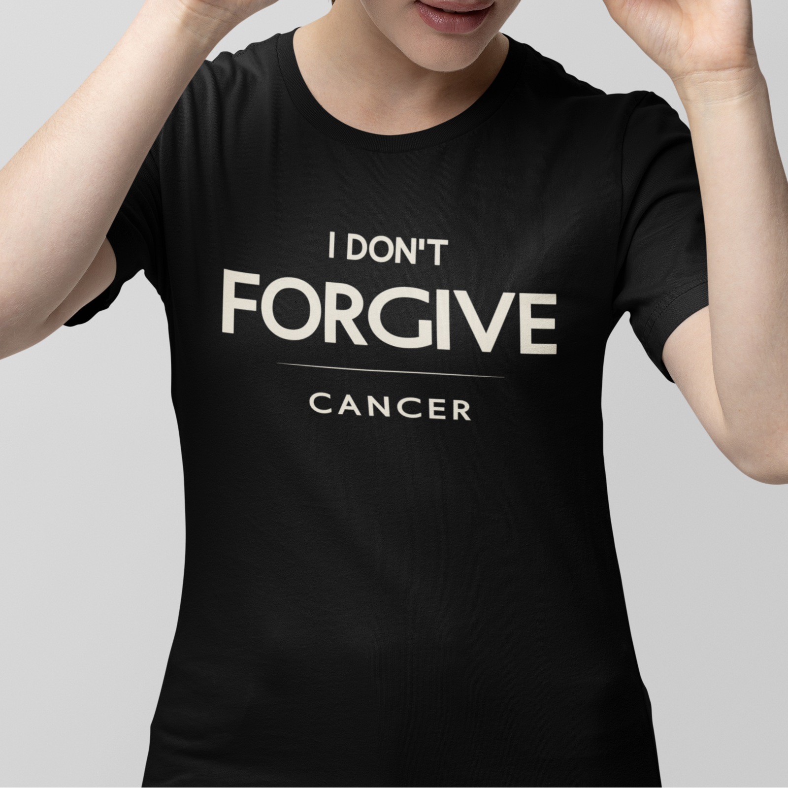 Model wearing Cancer zodiac t-shirt with “I don’t forgive” bold typography quote design.