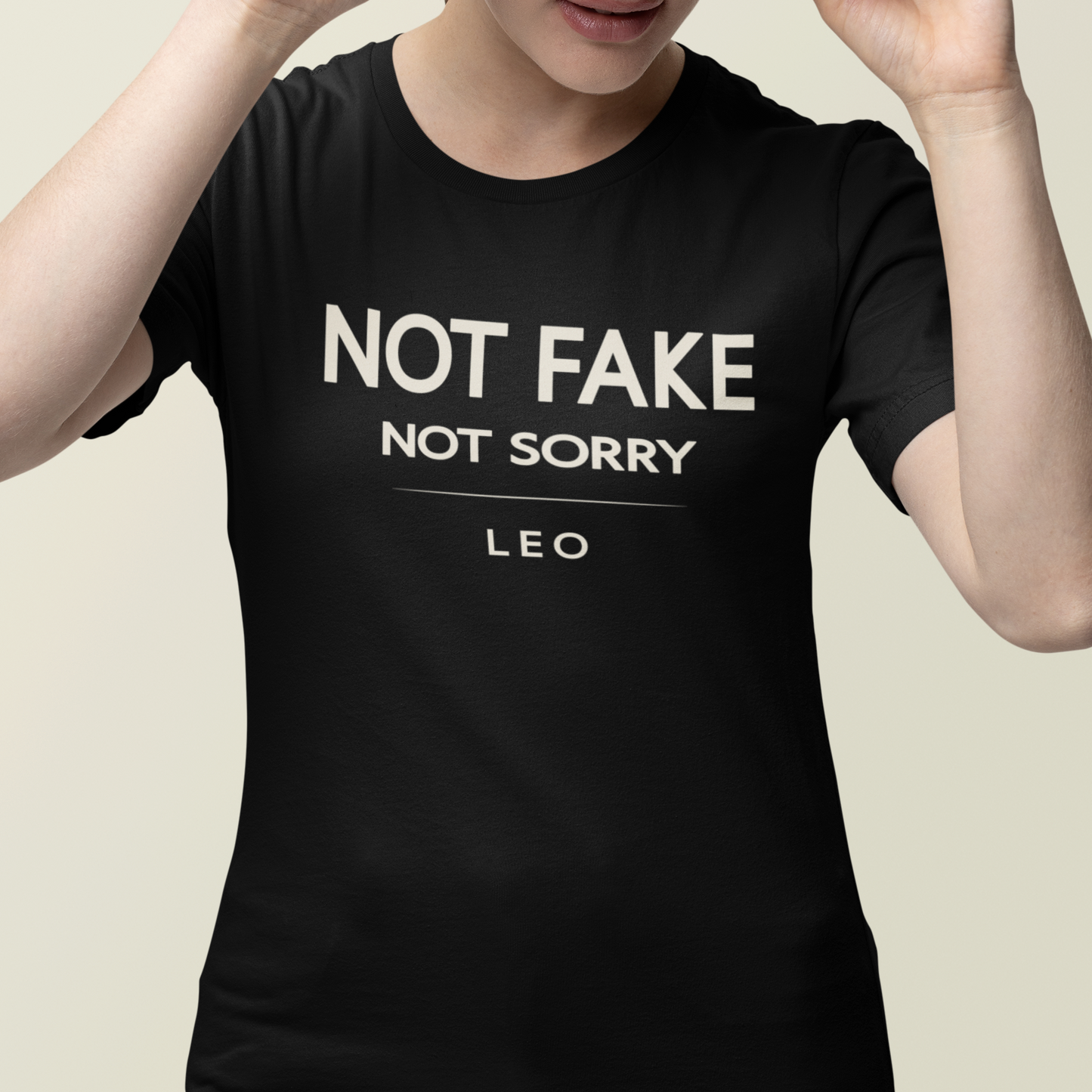 Model wearing Leo zodiac t-shirt with “Not Fake Not Sorry” typography quote
