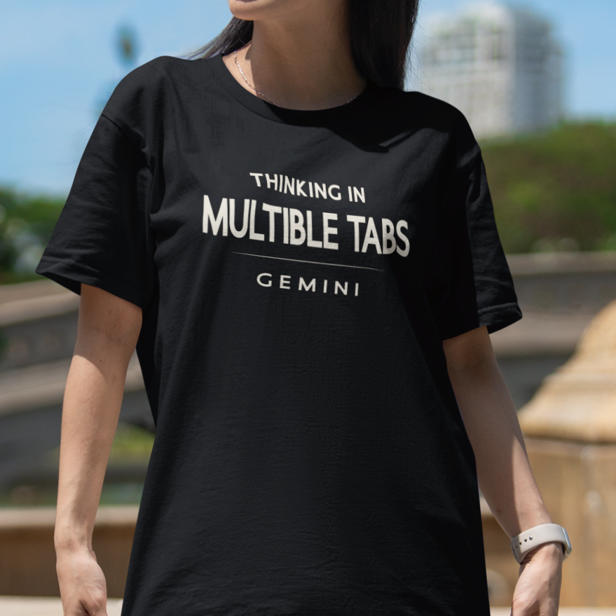 Model wearing Gemini zodiac t-shirt with “Thinking in Multiple Tabs” typography quote