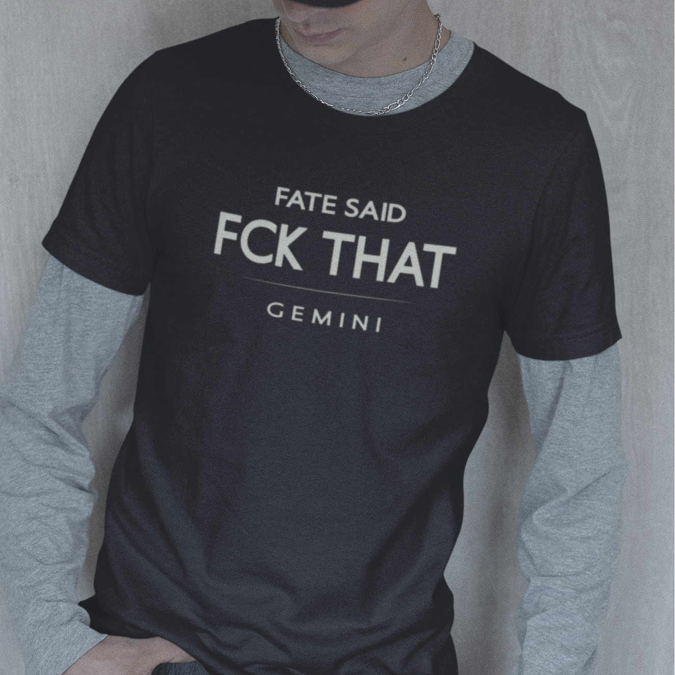 Model wearing Gemini zodiac t-shirt with “Fate Said FCK That” typography quote