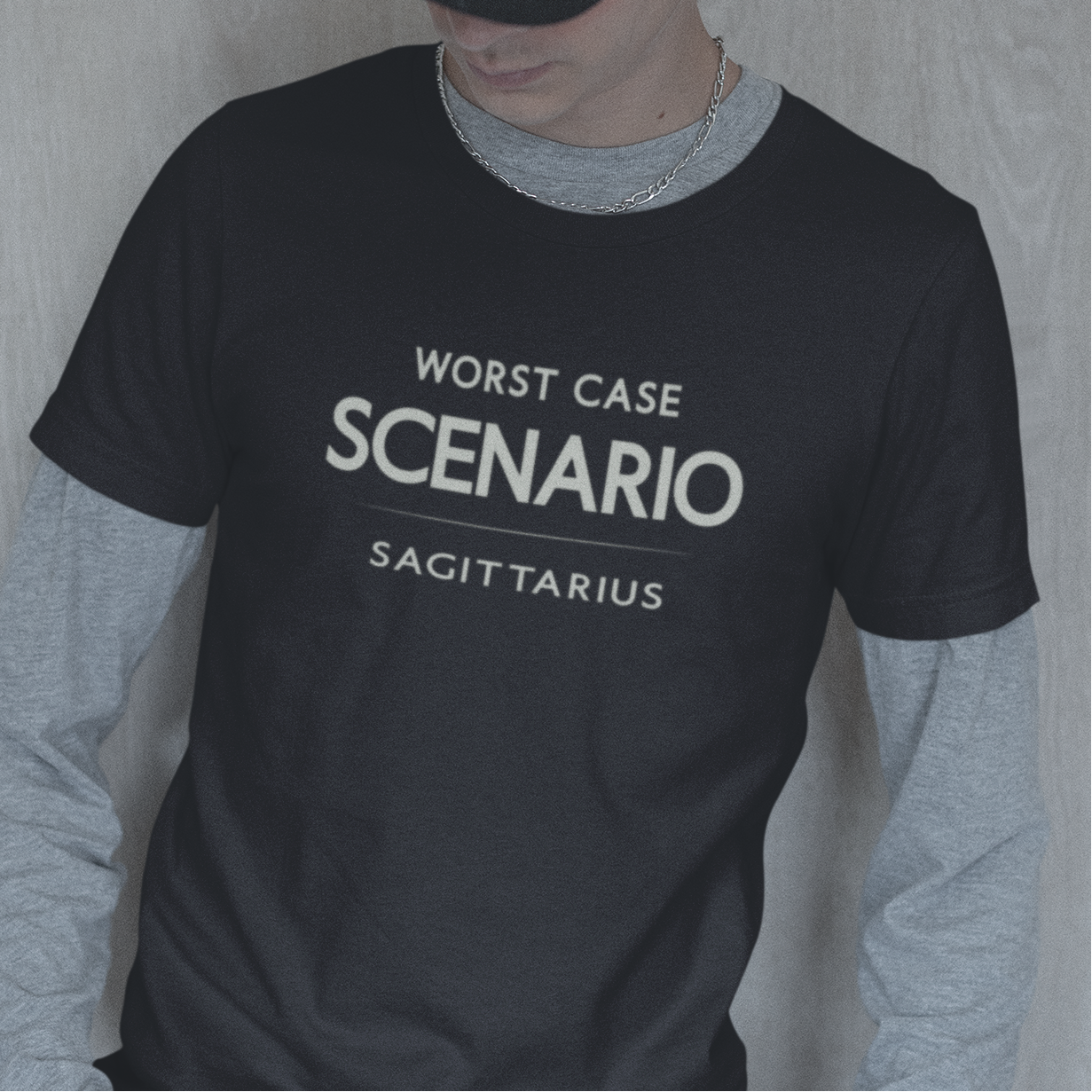 Model wearing Sagittarius zodiac t-shirt with “Worst Case Scenario” typography quote design