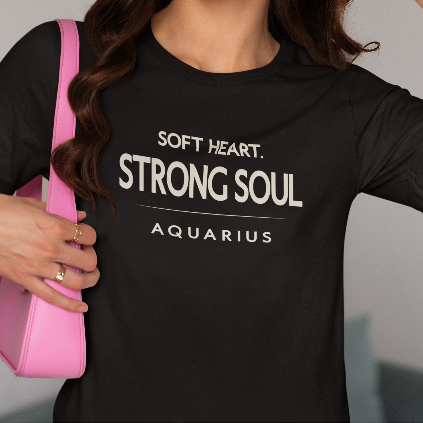 Model wearing Aquarius zodiac t-shirt with “Soft Heart Strong Soul” typography quote design