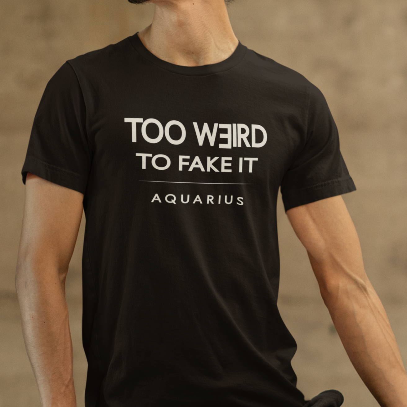 Model wearing Aquarius zodiac t-shirt with “Too Weird to Fake It” typography quote design