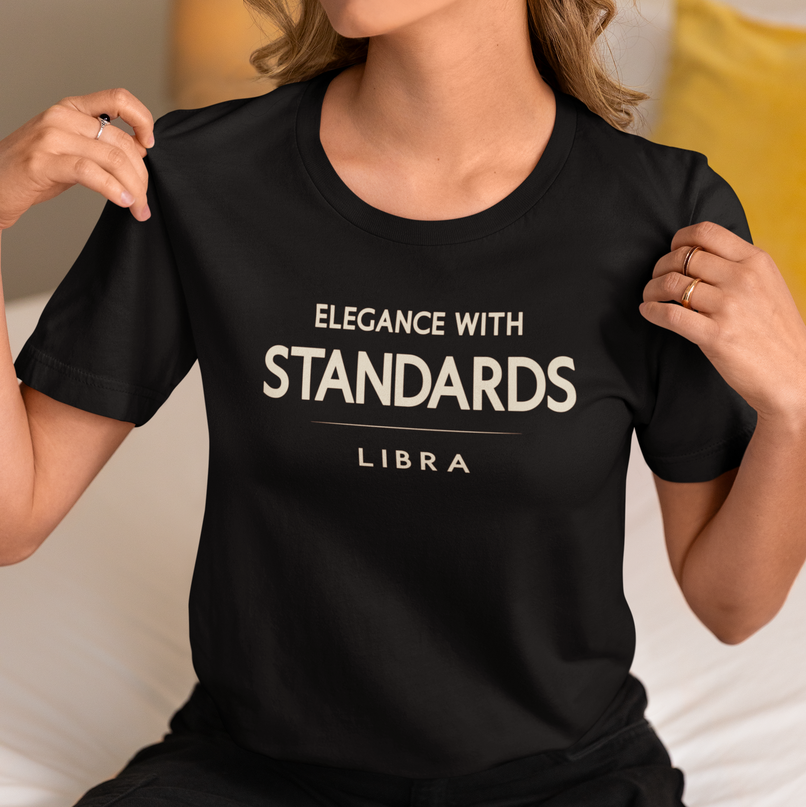 Model wearing Libra zodiac t-shirt with “Elegance With Standards” typography quote
