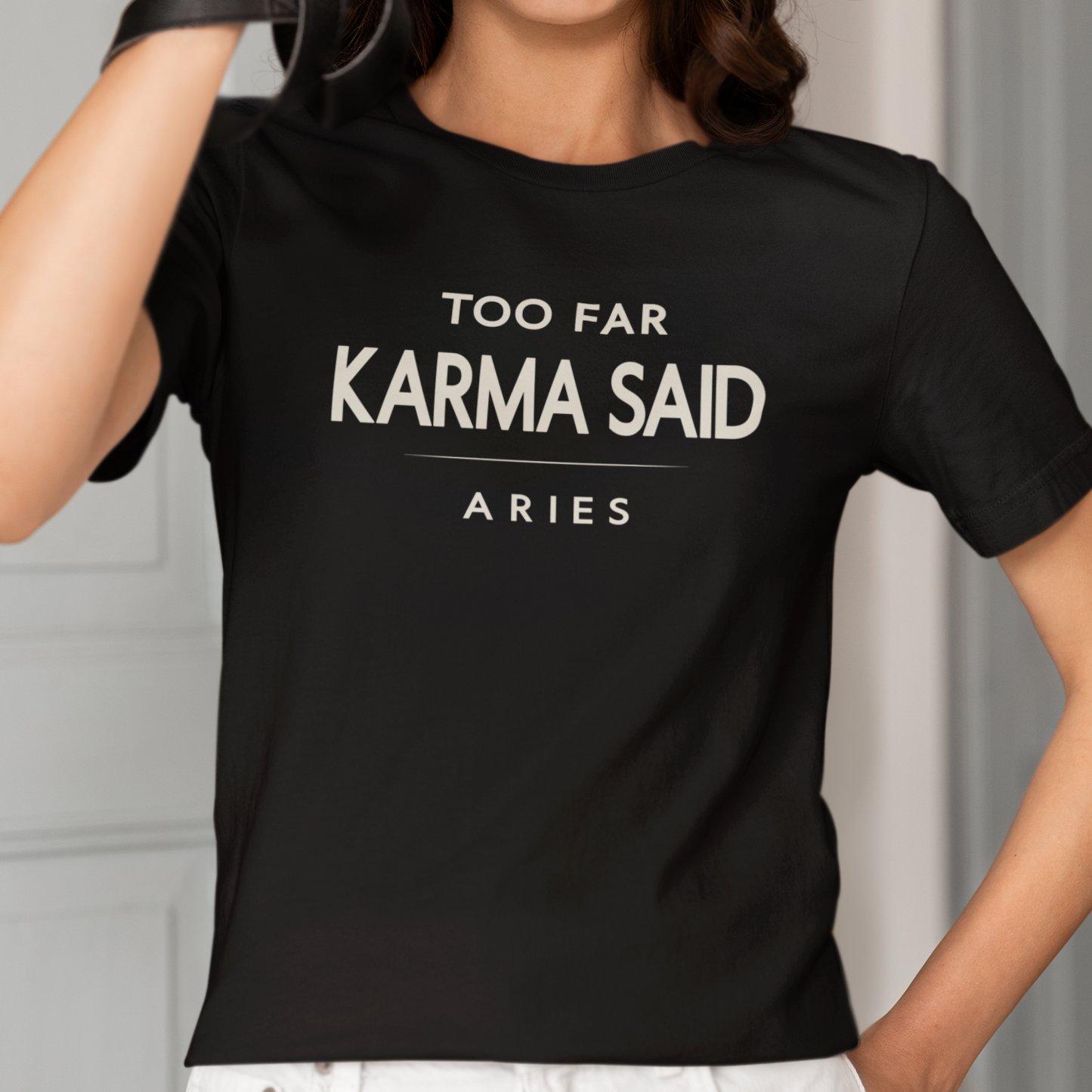 Model wearing Aries zodiac t-shirt with “Too Far Karma Said” typography quote