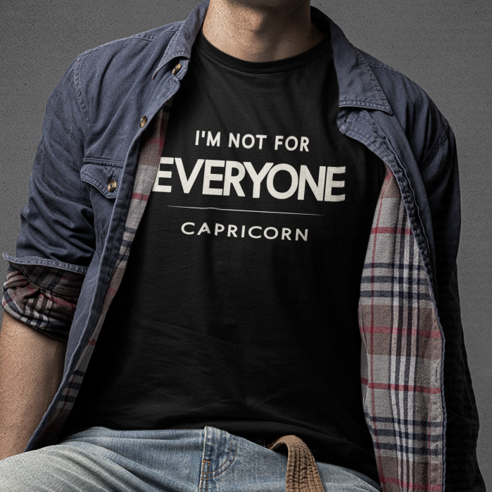 Model wearing Capricorn zodiac t-shirt with “I’m Not for Everyone” typography quote design
