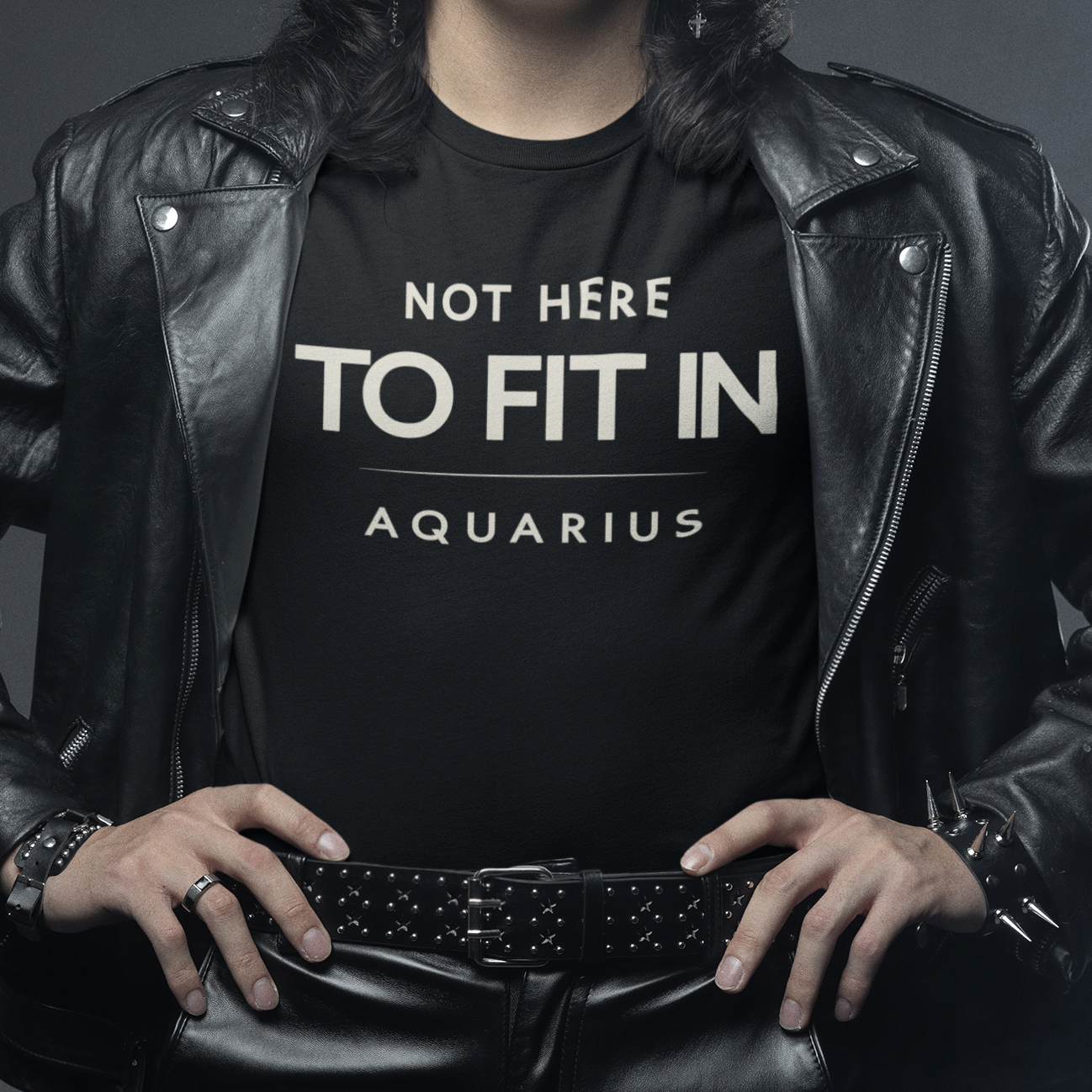 Model wearing Aquarius zodiac T-shirt with not here to fit in quote design.