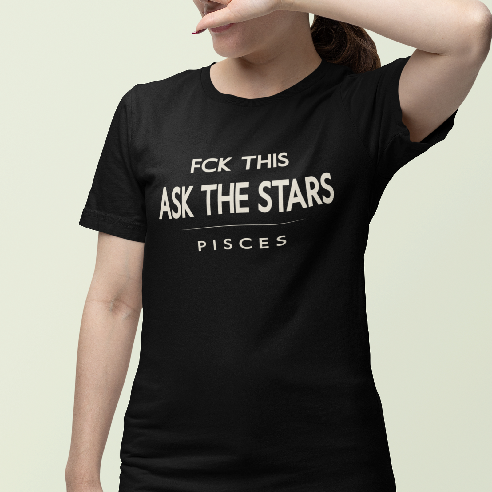 Model wearing Pisces zodiac t-shirt with “Fck This Ask the Stars” typography quote