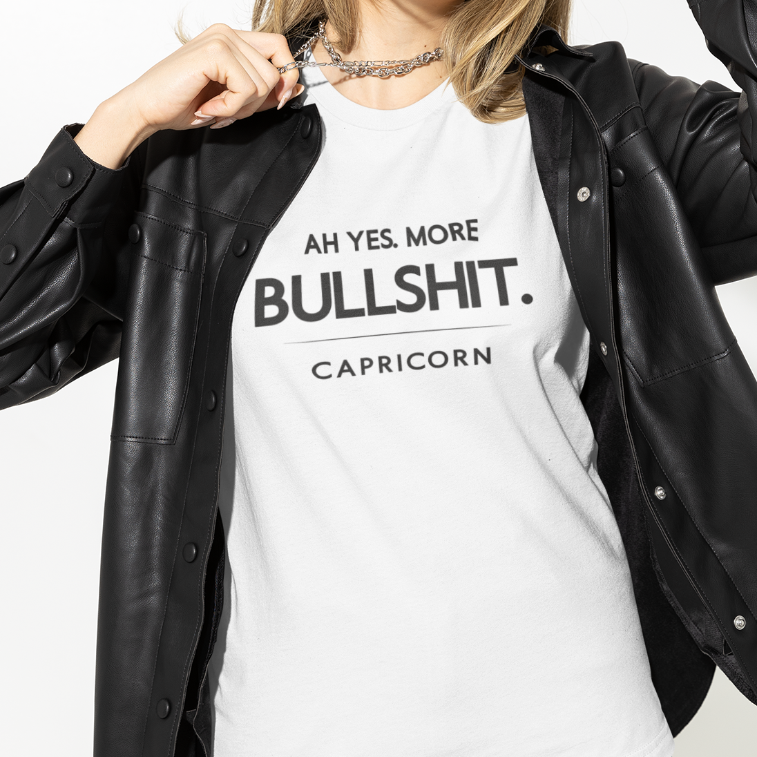 Model wearing Capricorn zodiac t-shirt with “Ah Yes. More Bullshit” typography quote