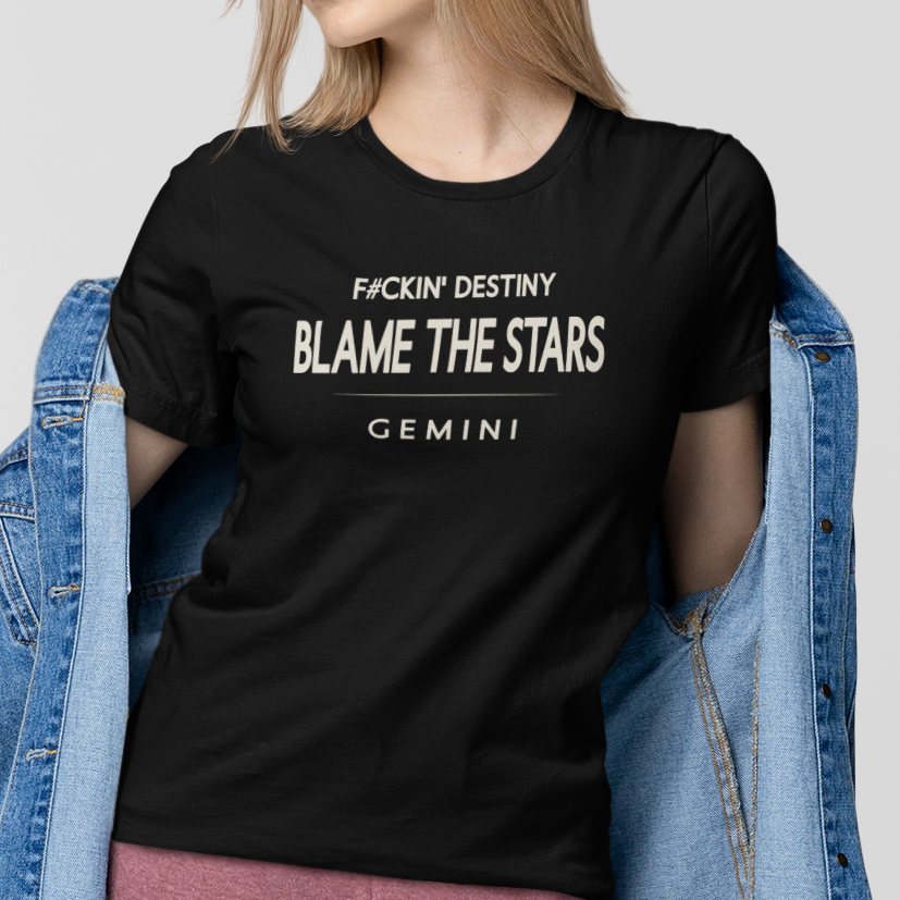 Model wearing Gemini zodiac t-shirt with “F#ckin' Destiny Blame the Stars” typography quote