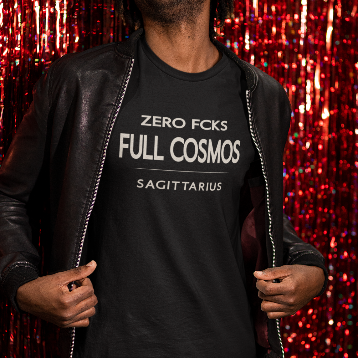 Model wearing Sagittarius zodiac t-shirt with “Zero Fcks Full Cosmos” typography quote