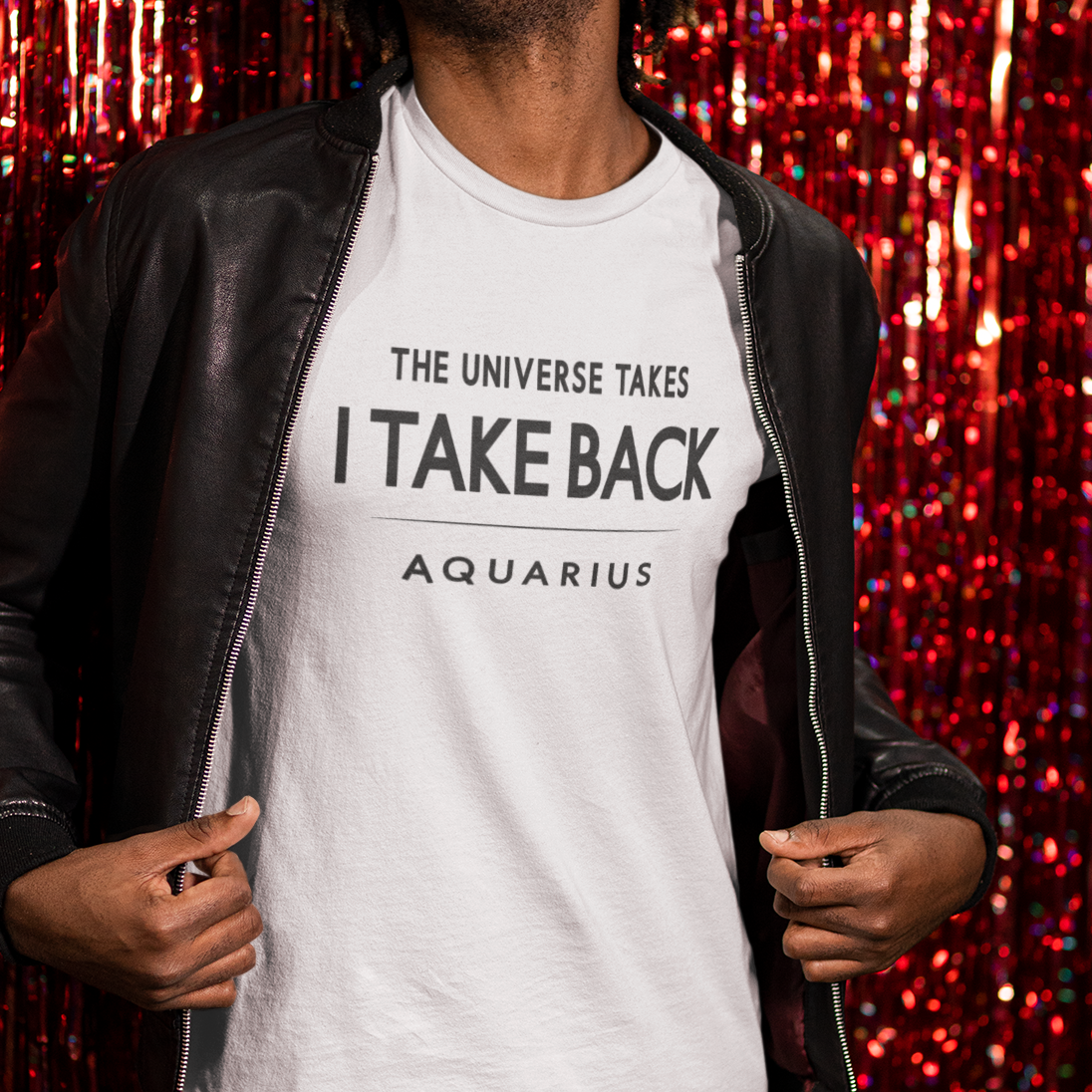 Model wearing Aquarius zodiac t-shirt with “The Universe Takes I Take Back” typography quote