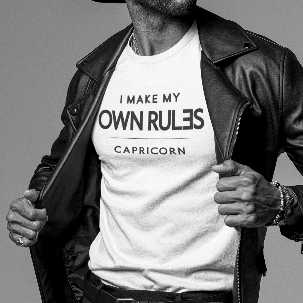 Model wearing Capricorn zodiac t-shirt with “I Make My Own Rules” typography quote design