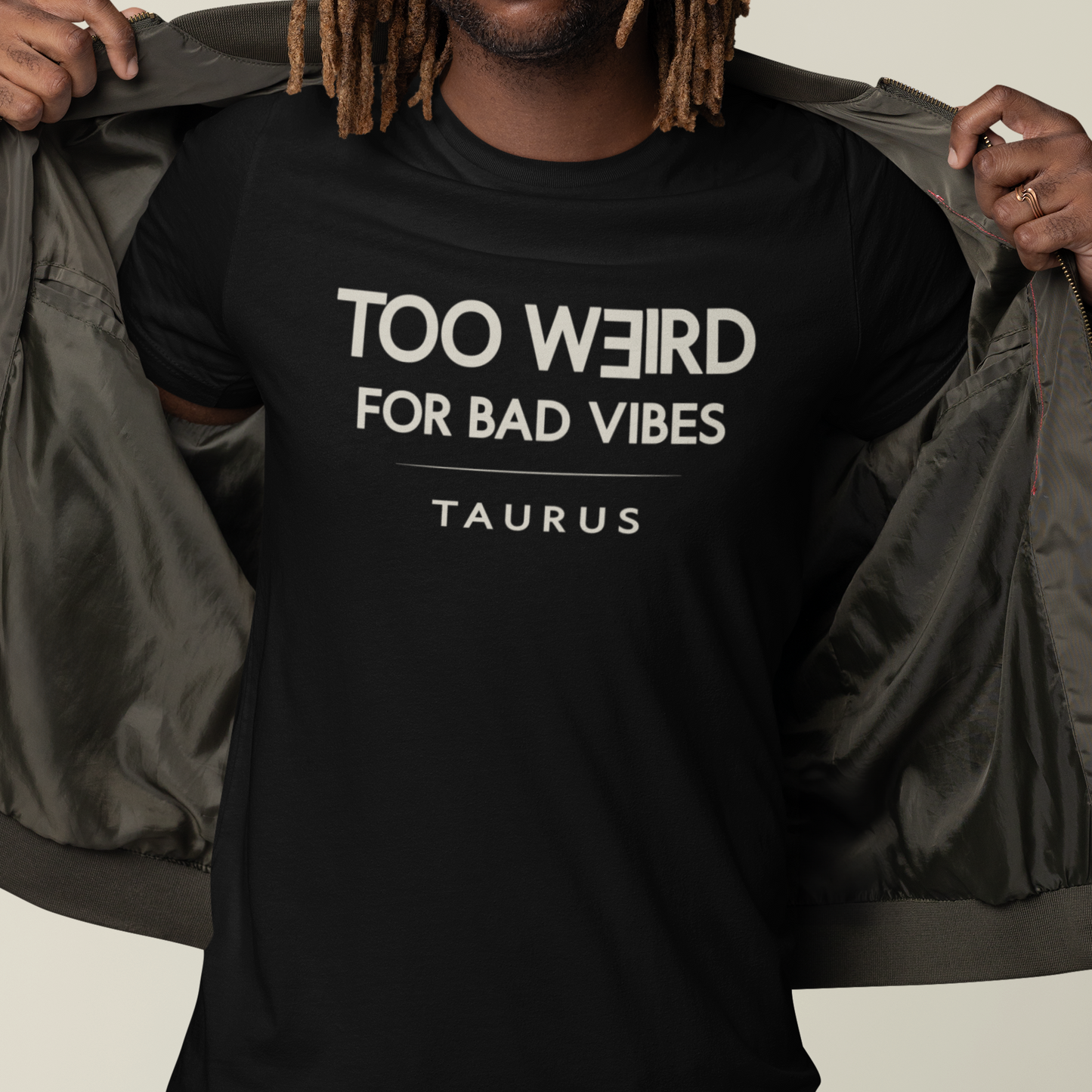 Model wearing Taurus zodiac t-shirt with “Too Weird for Bad Vibes” typography quote design