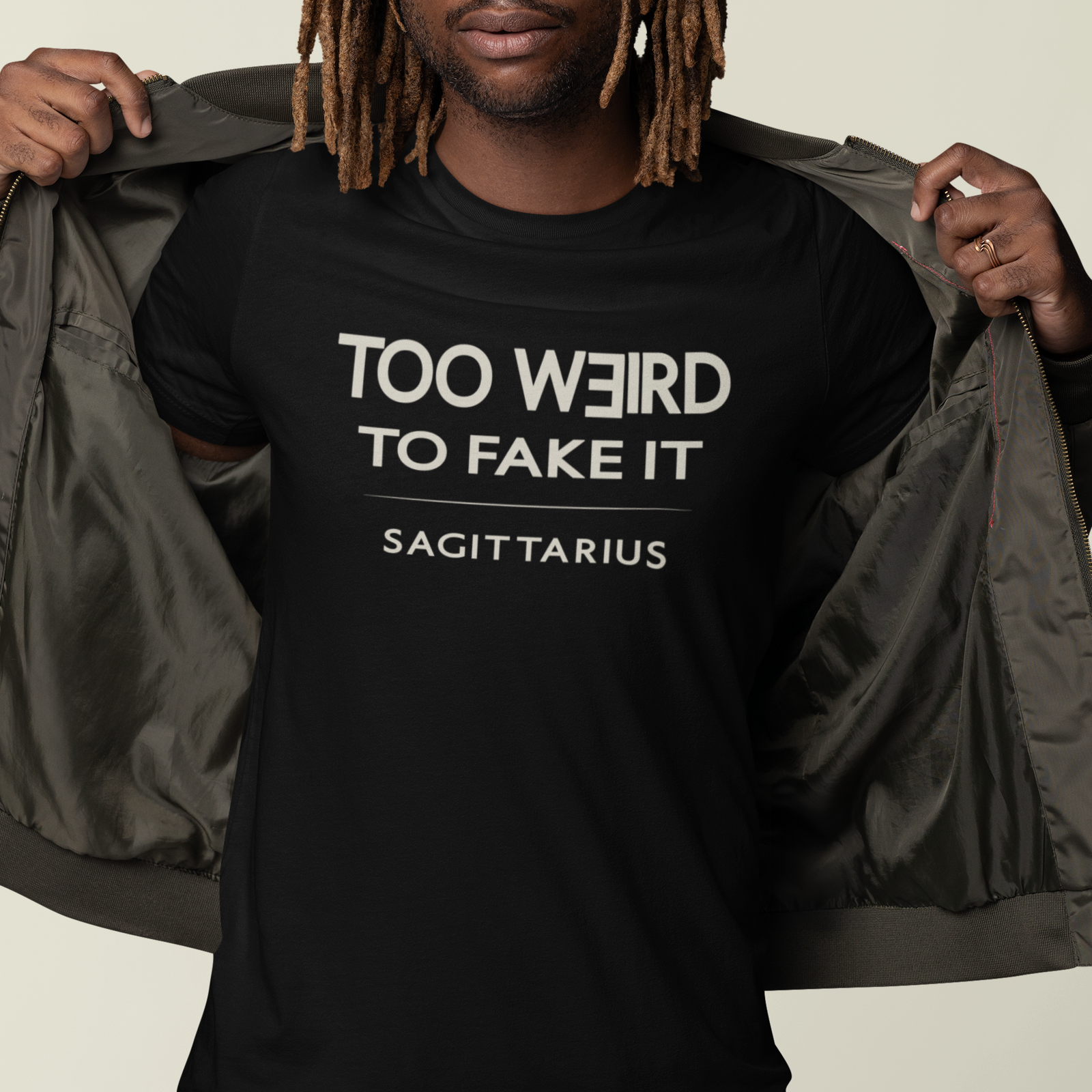 Model wearing Sagittarius zodiac t-shirt with “Too Weird to Fake It” typography quote design