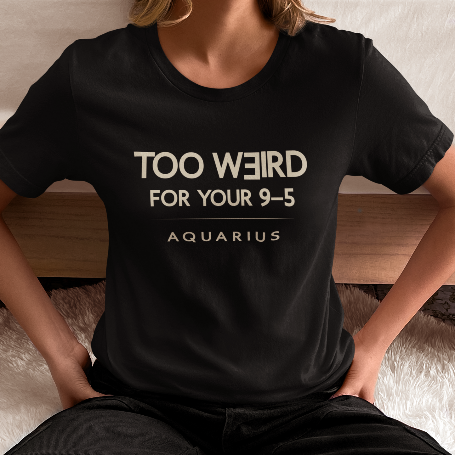Model wearing Aquarius zodiac t-shirt with “Too Weird for Your 9–5” typography quote