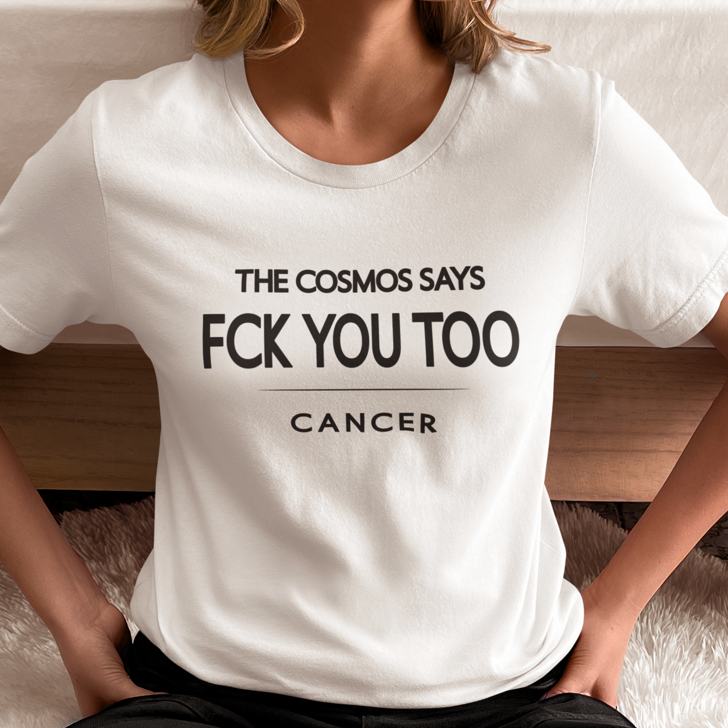 Model wearing Cancer zodiac t-shirt with bold typography quote “The cosmos says FCK you too”.