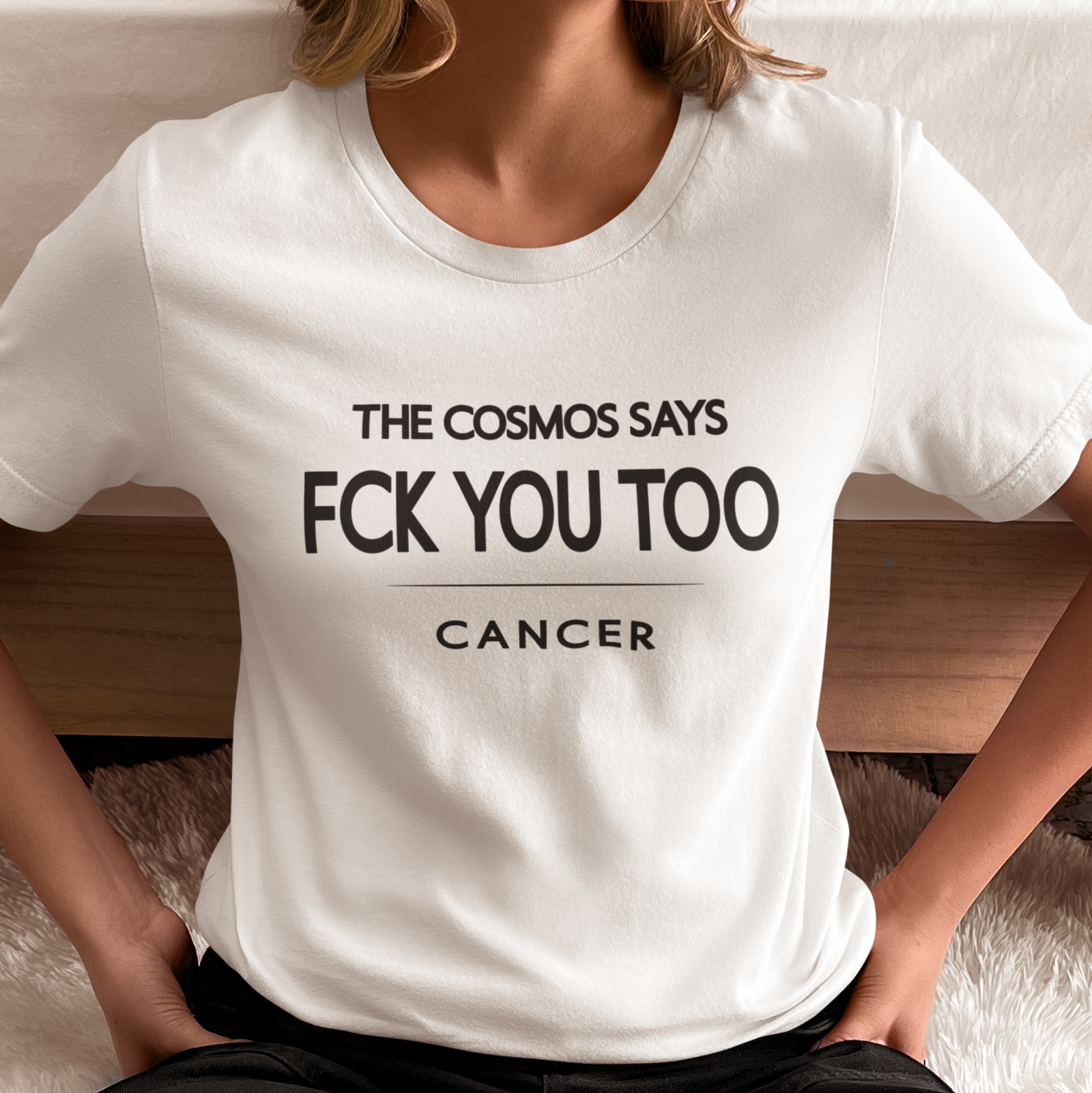 Model wearing Cancer zodiac t-shirt with bold typography quote “The cosmos says FCK you too”.